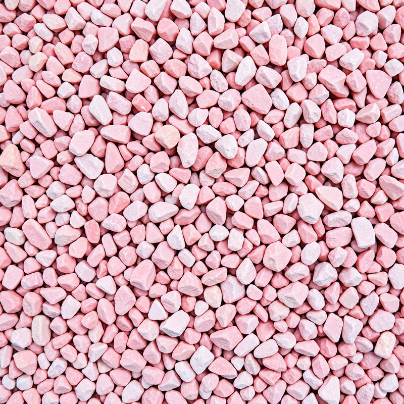 Pink marble chips with soft blush tones filling the frame