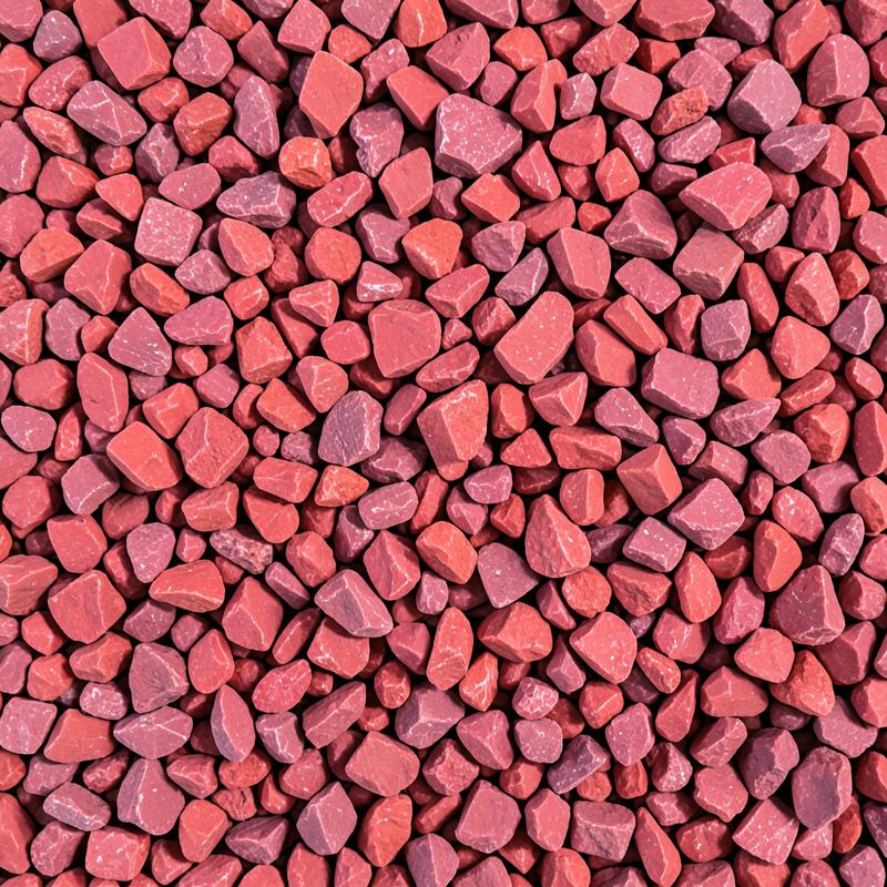 Red marble chips with warm rust tones filling the frame